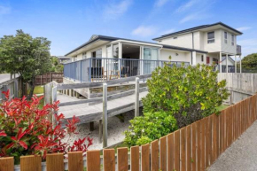 Modern 2-Bedroom Oasis Just Steps from the Beach